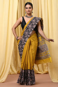 Mustard Yellow & Black Floral Motifs Bagru Hand Block Printed Mul Cotton Saree With Blouse Piece