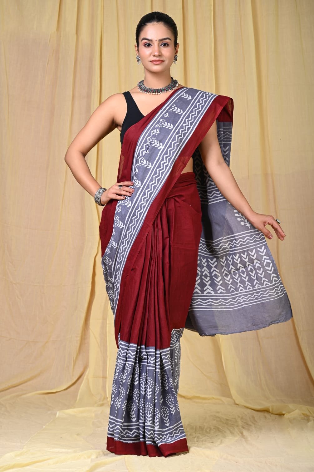 Maroon and grey saree with hand block jaal patterns and border