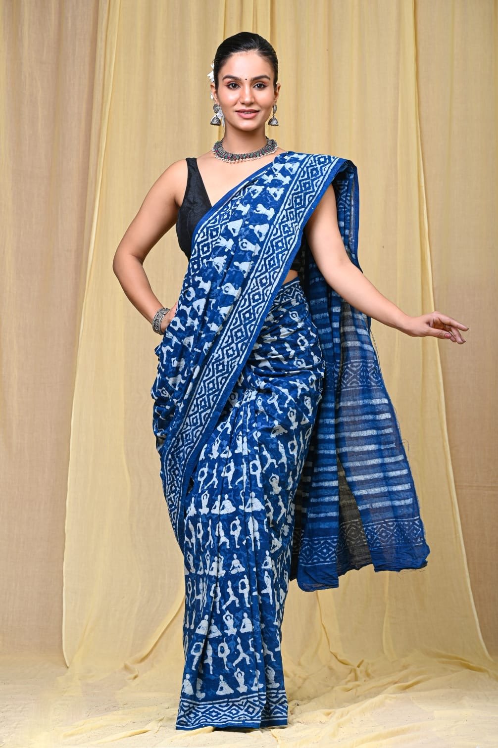 Blue saree with Ikat pattern and geometric motifs in Bagru hand block print