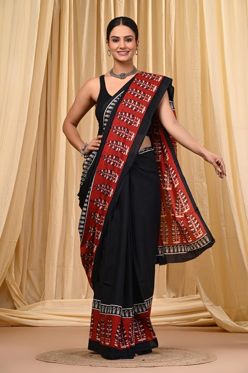 Black and red saree with floral Bagru hand block print design and intricate border