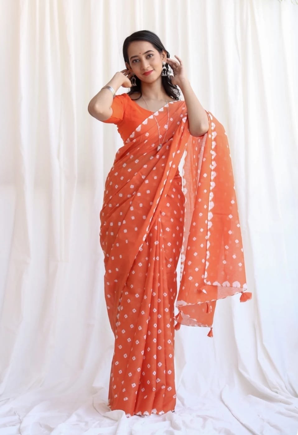 Orange saree with white geometric motifs, Bagru hand block print
