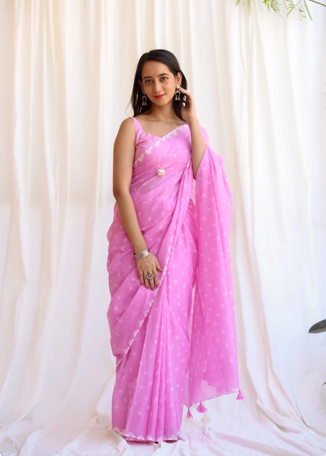 Pink saree with floral motifs in Bagru hand block print
