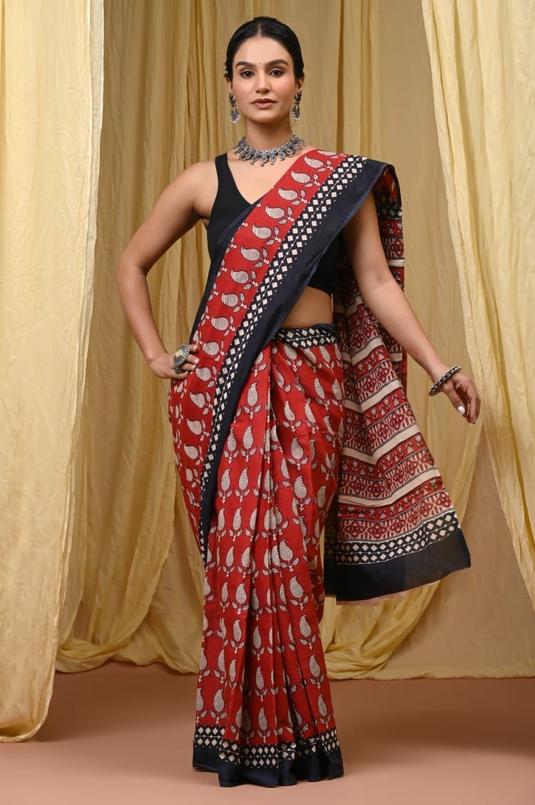 Red saree with floral motifs and black border, Bagru hand block print
