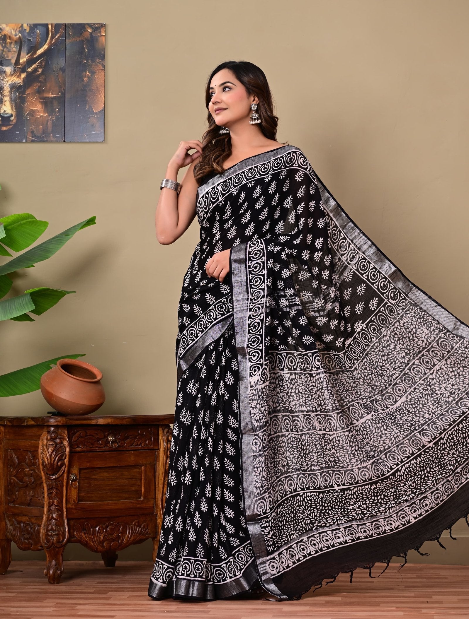 Black saree with white floral motifs, Bagru hand block print