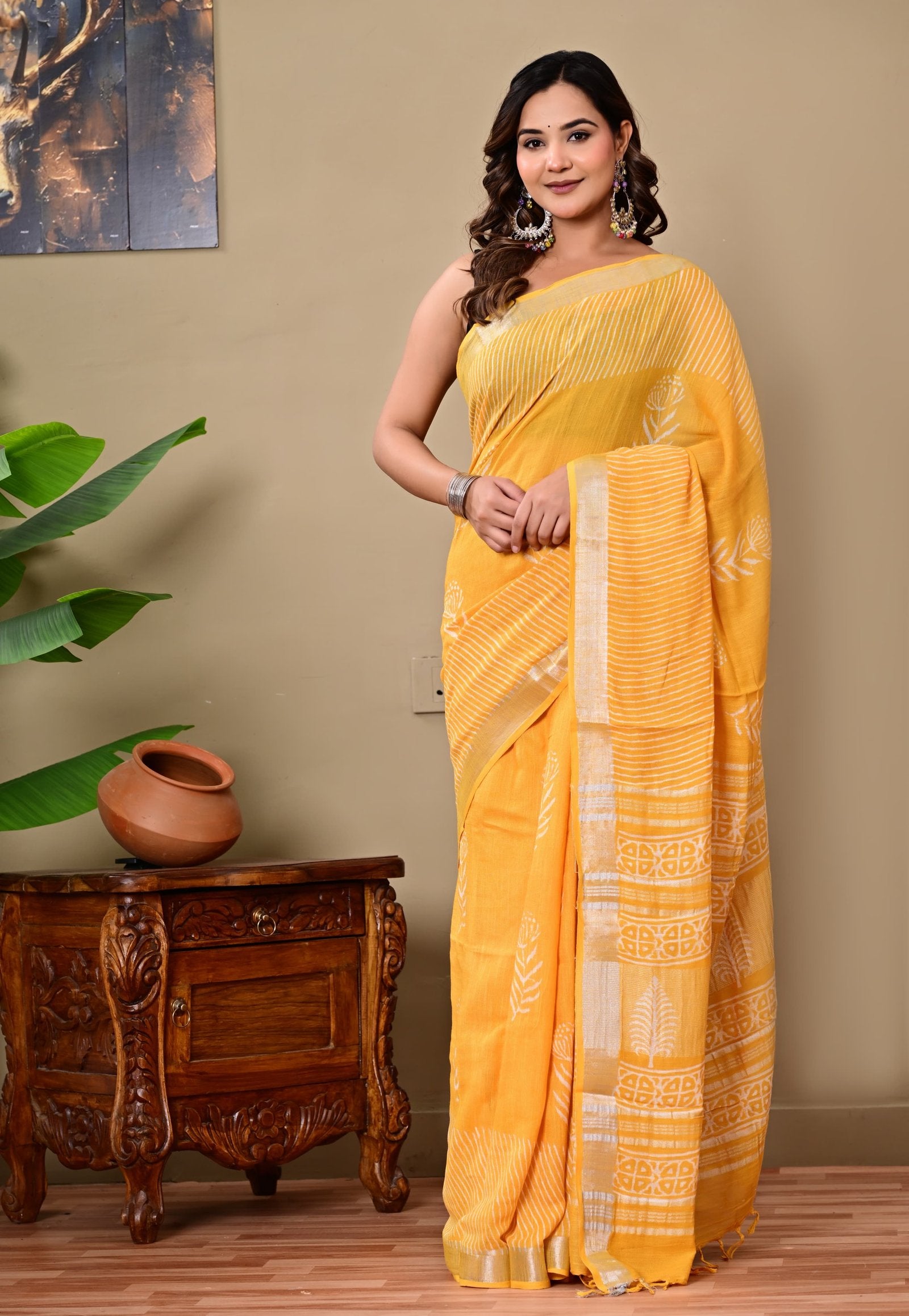 Yellow saree with floral and geometric Bagru hand block print design