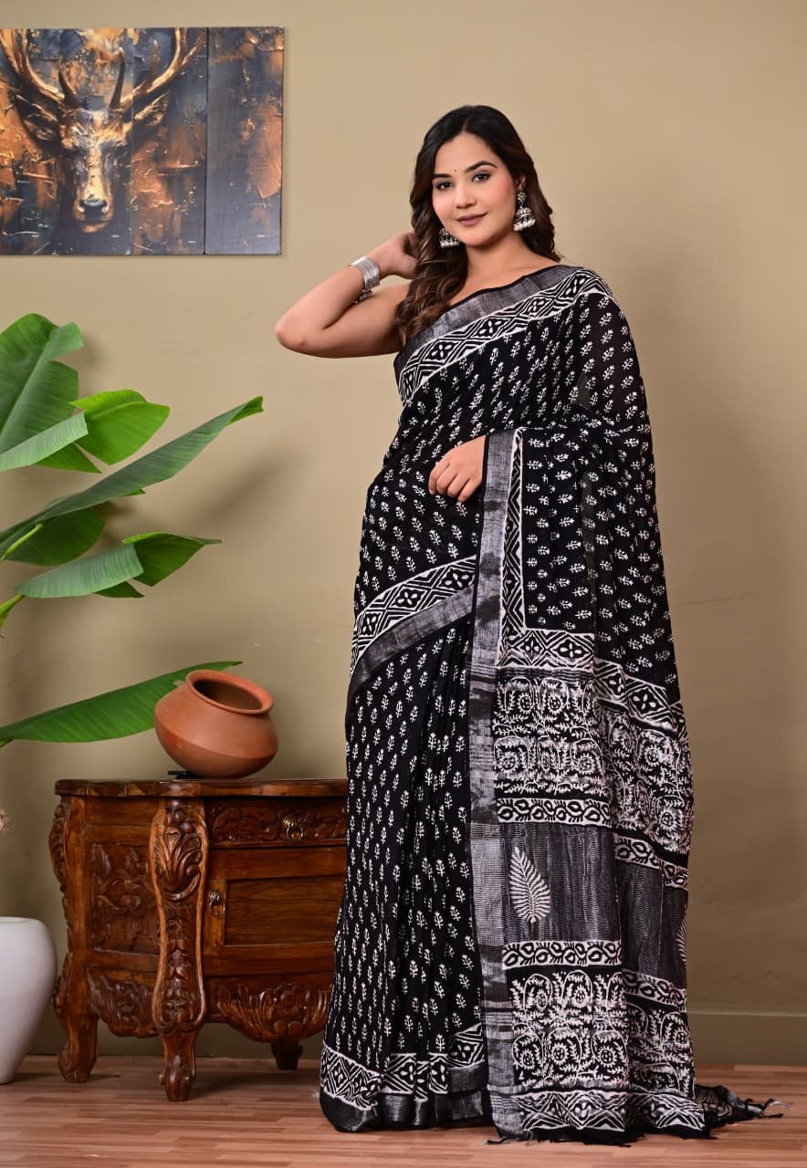 Black saree with white floral motifs in Bagru hand block print