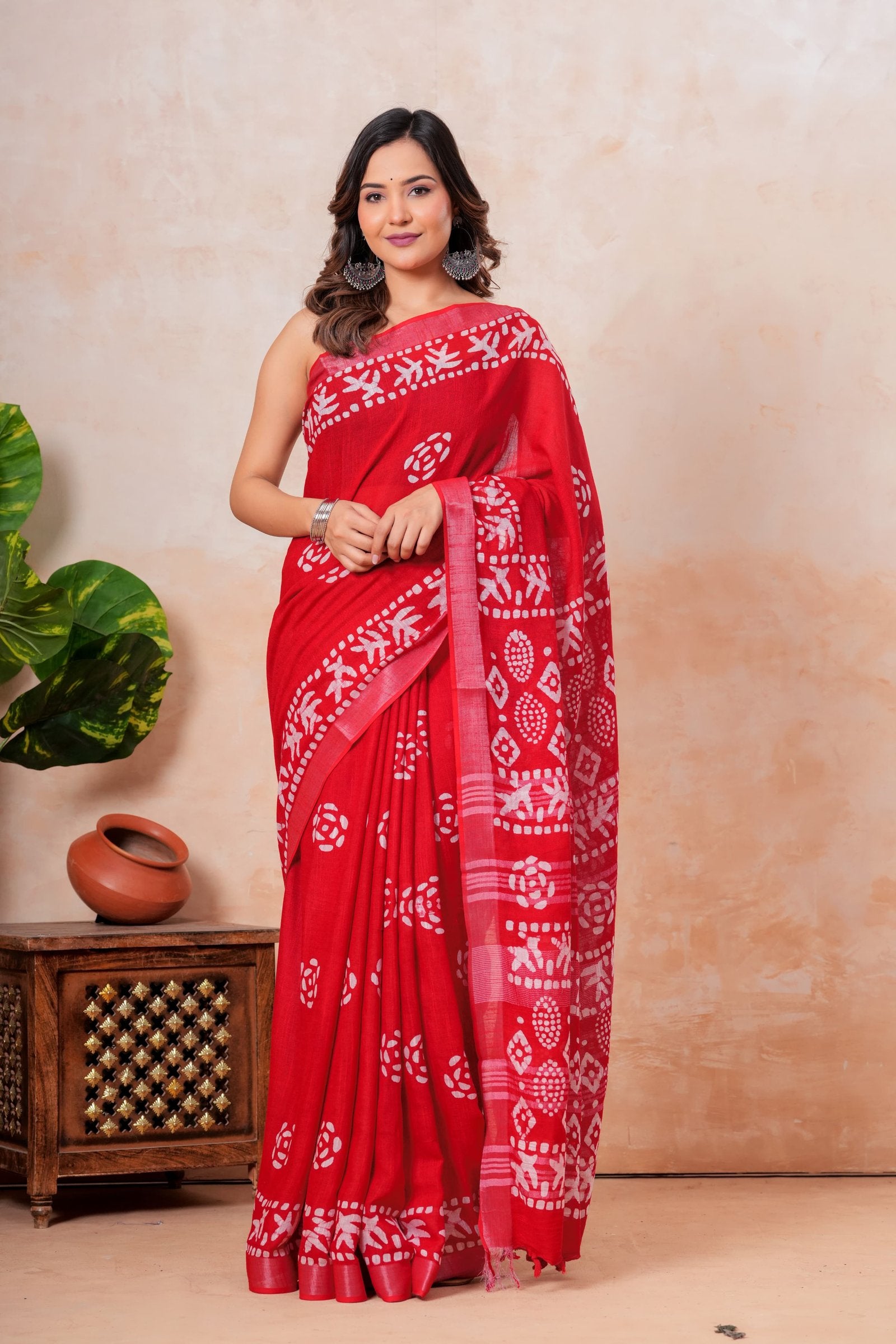 Red saree with white floral and geometric Bagru hand block print motifs
