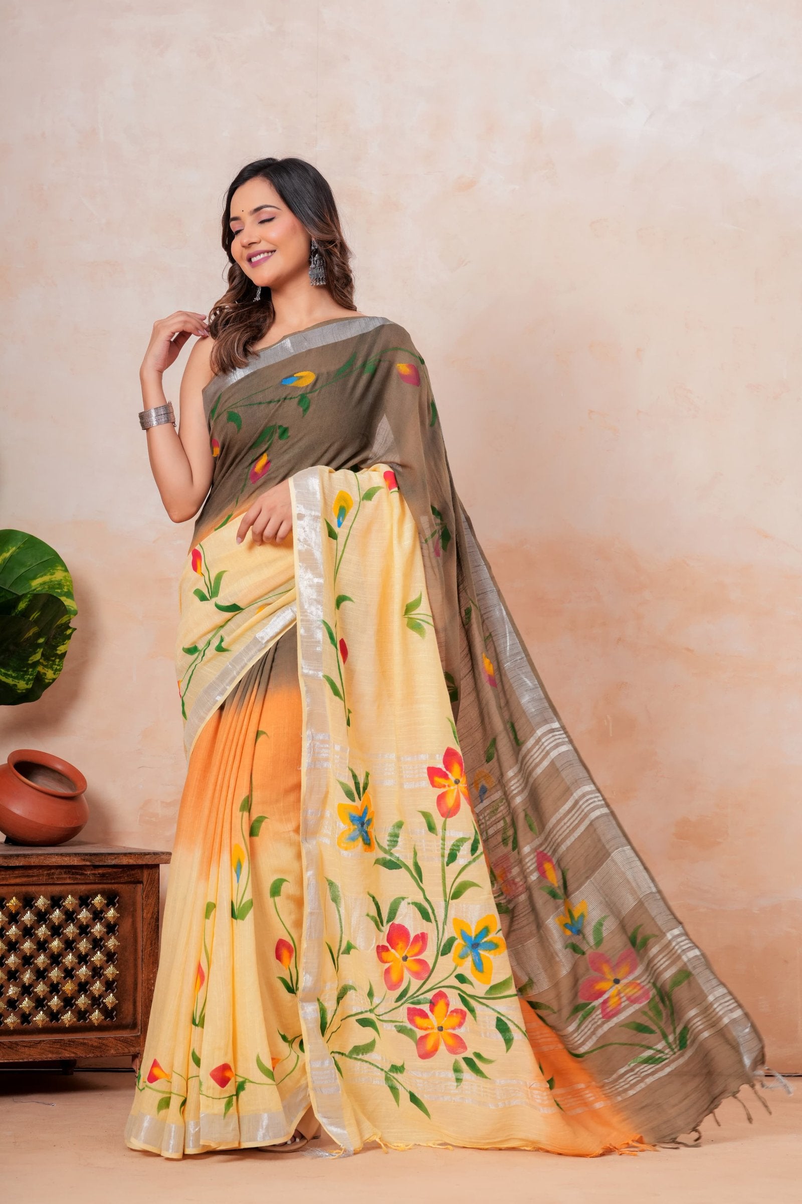 Saree with taupe and vibrant multicolor floral motifs in Bagru hand block print