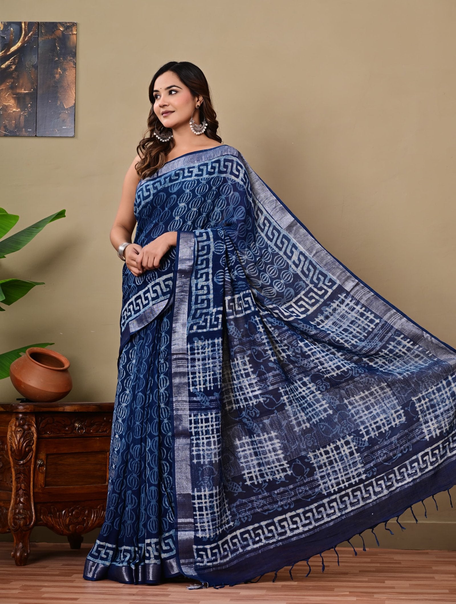Blue saree with geometric Bagru hand block print pattern and natural linen texture
