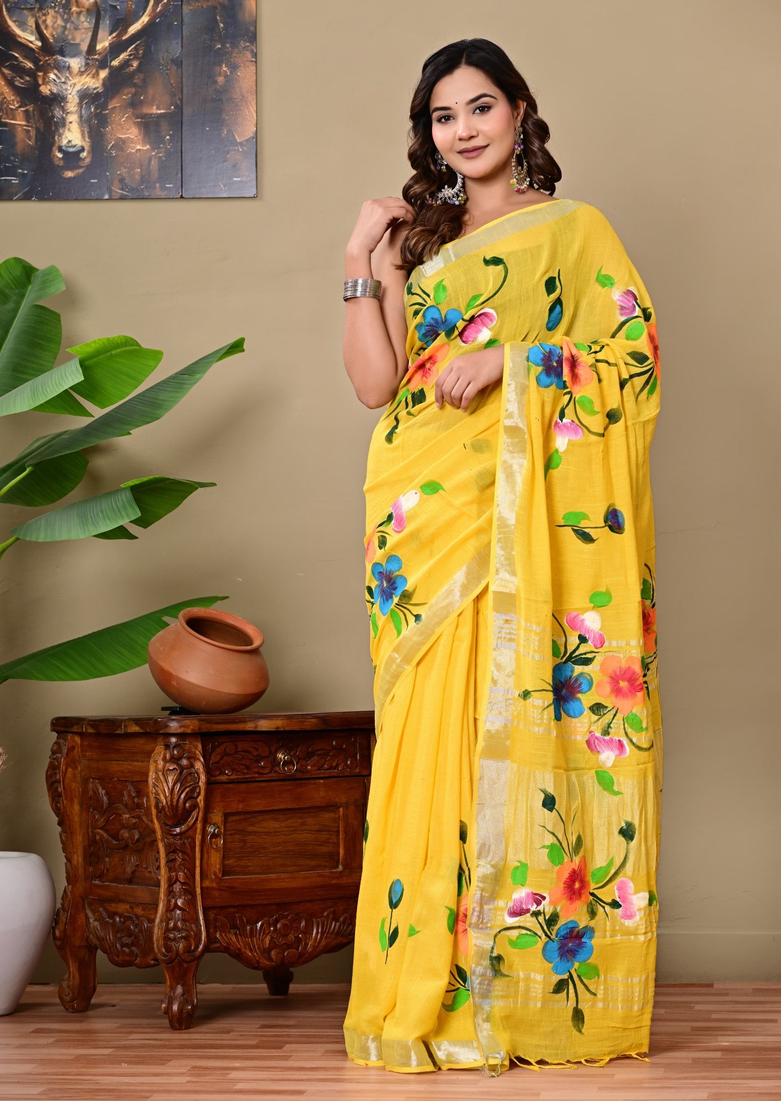 Yellow saree with vibrant floral motifs and Bagru hand block print