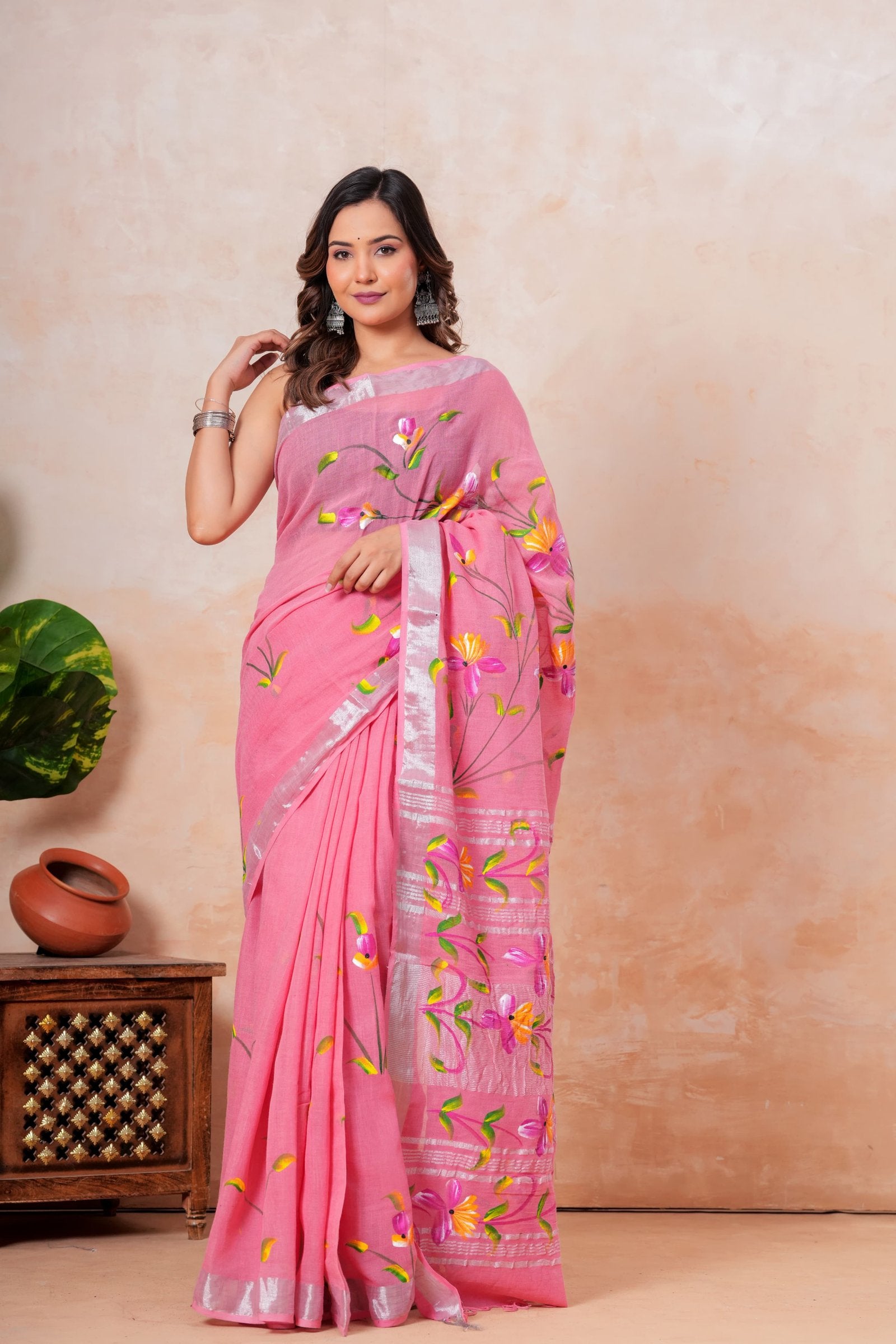 Pink saree with vibrant floral hand block print and silver border