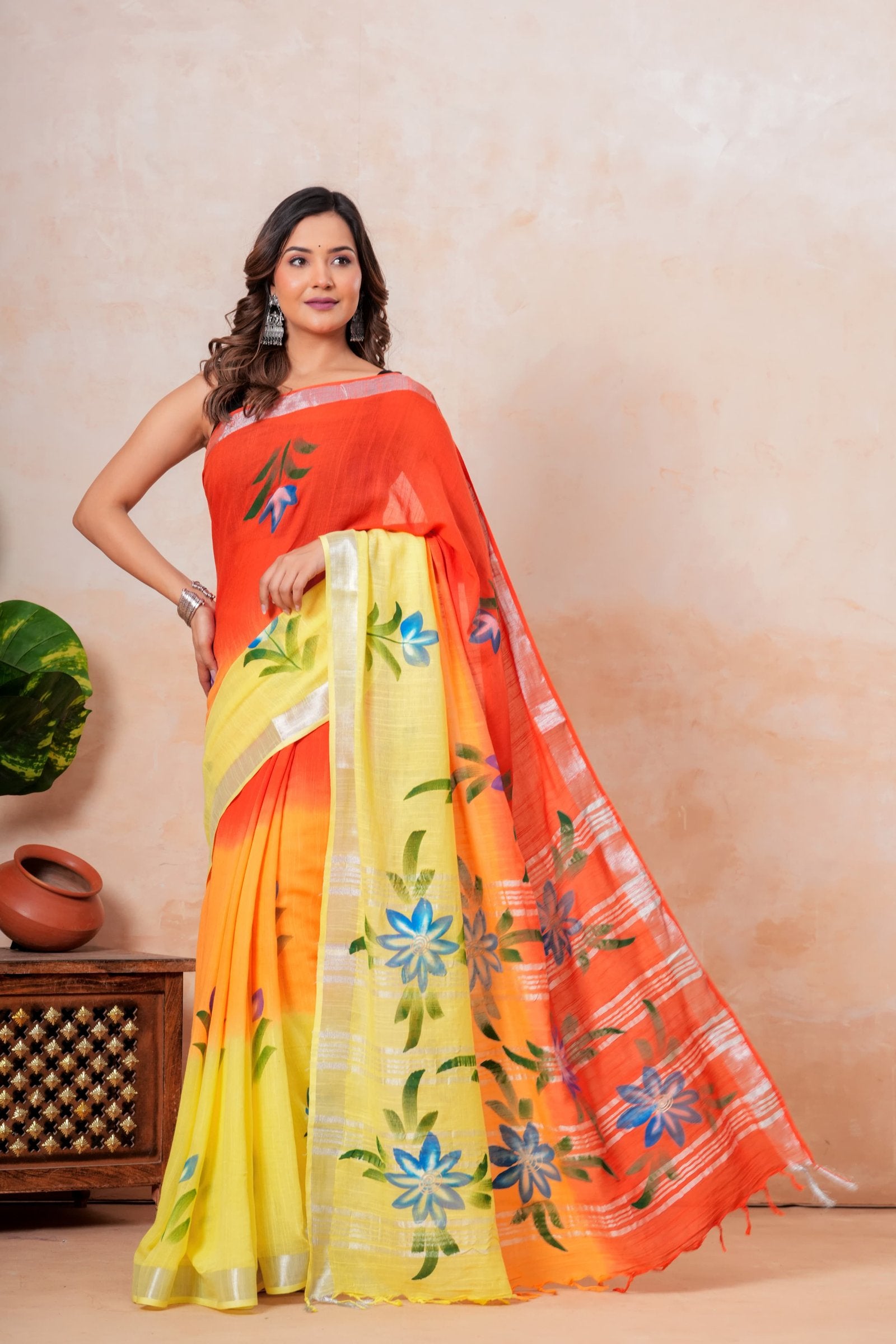 Colorful saree with orange, yellow, and floral hand block print design