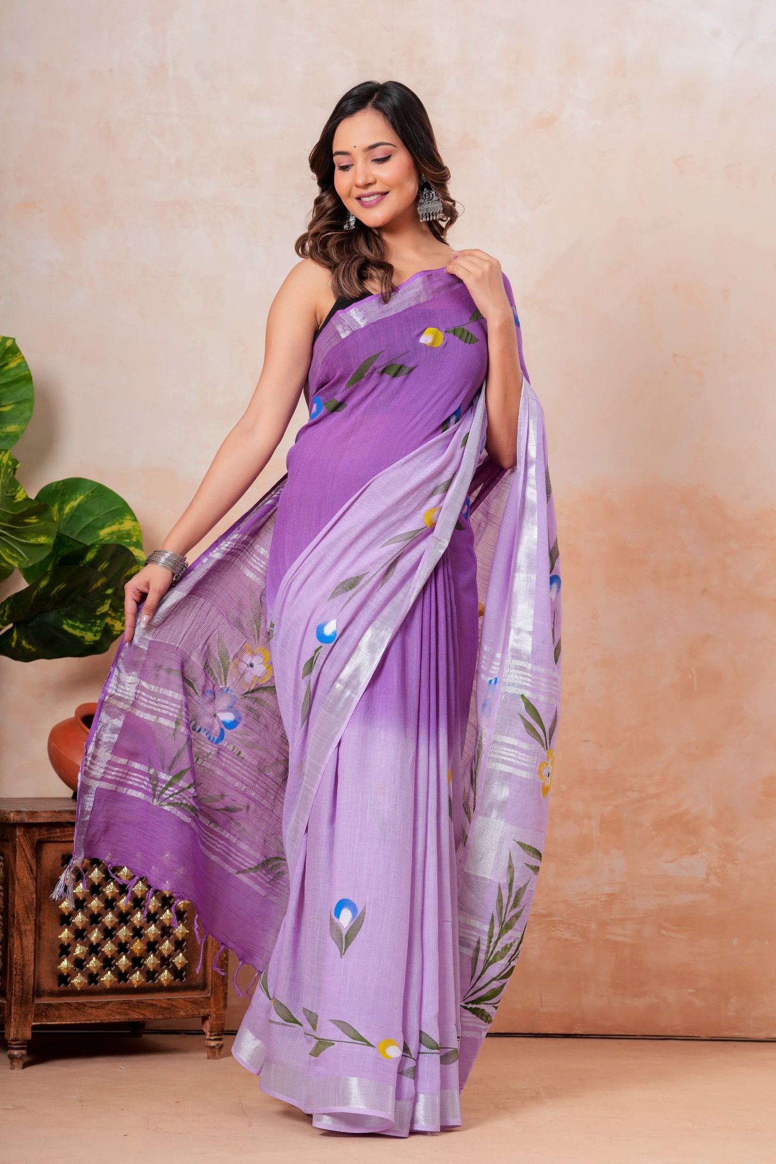 Purple saree with floral motifs and silver border, traditional Bagru design