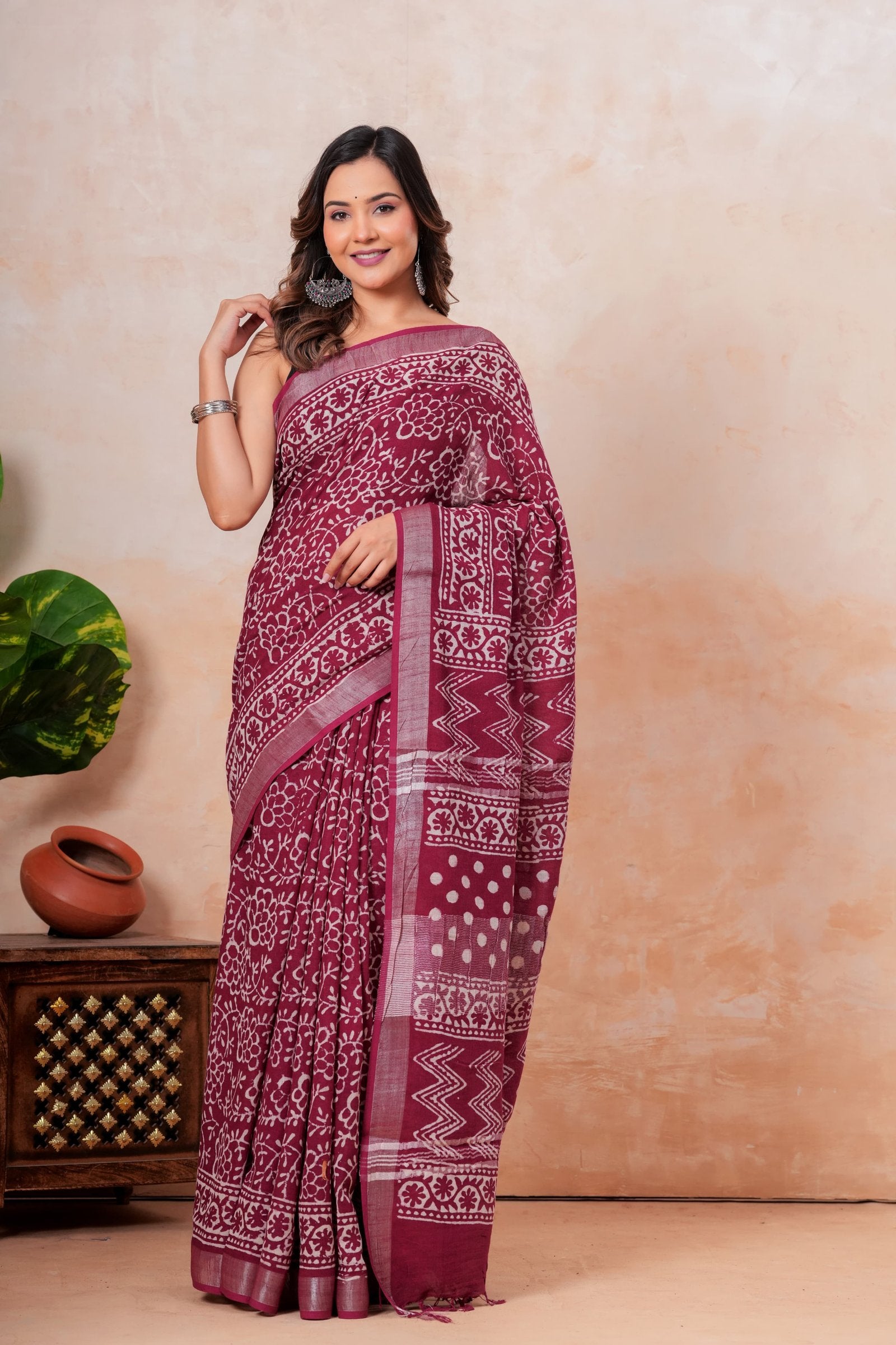 Maroon saree with floral and geometric Bagru hand block print motifs