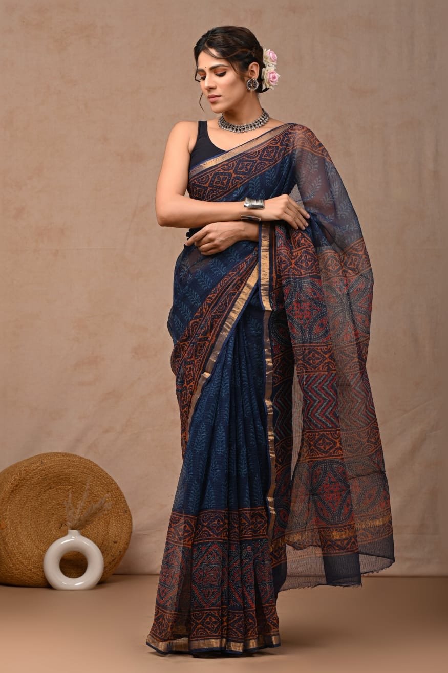 Navy blue saree with geometric Bagru hand block print motifs and gold border