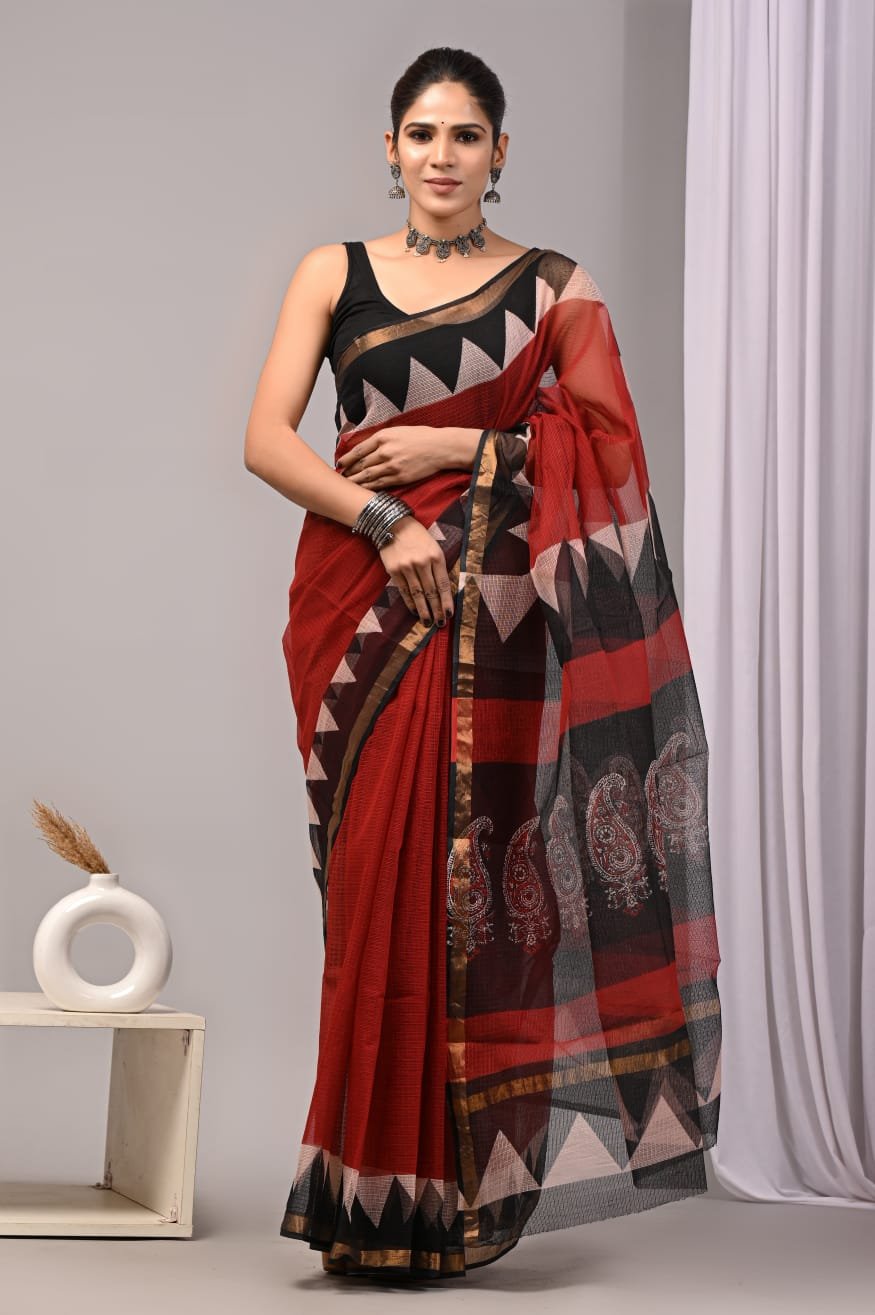 Red and black saree with geometric and paisley patterns in Kota Doriya fabric
