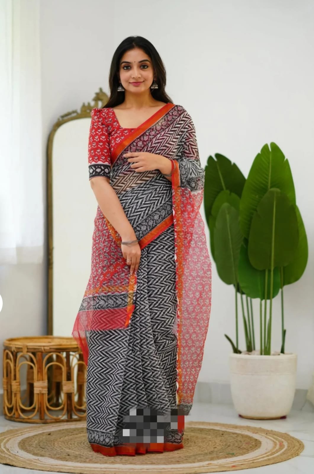 Red and black saree with geometric and floral Bagru hand block print