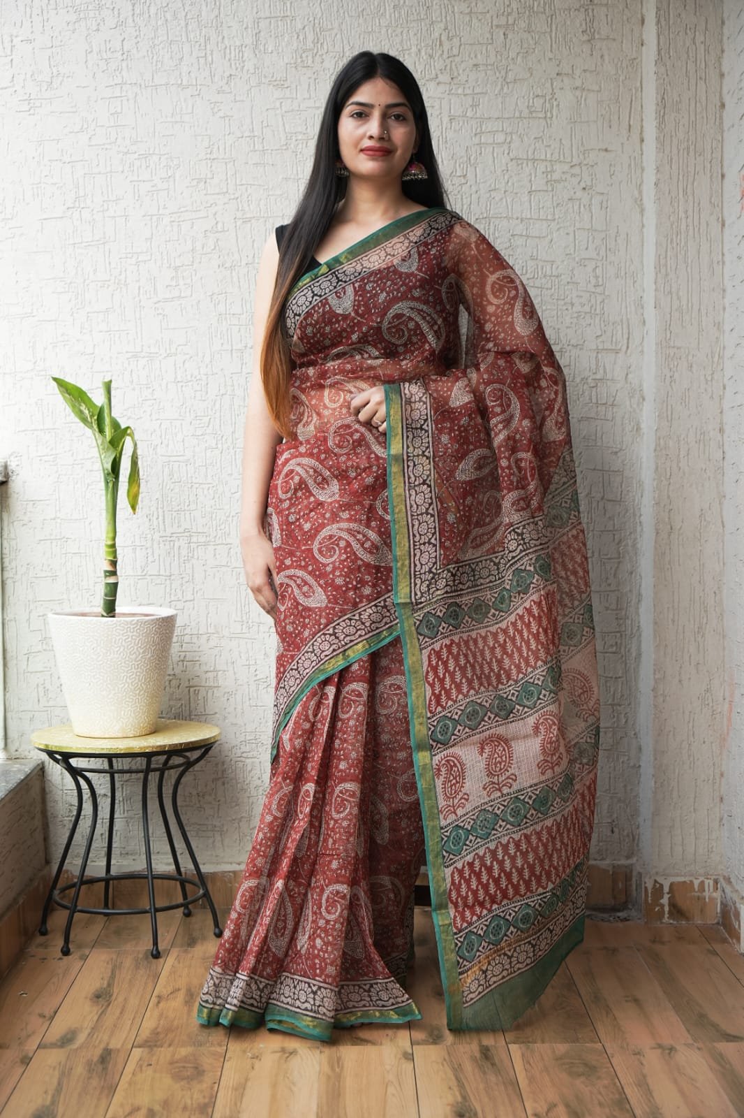 Red Kota Doriya saree with paisley motifs and green border design