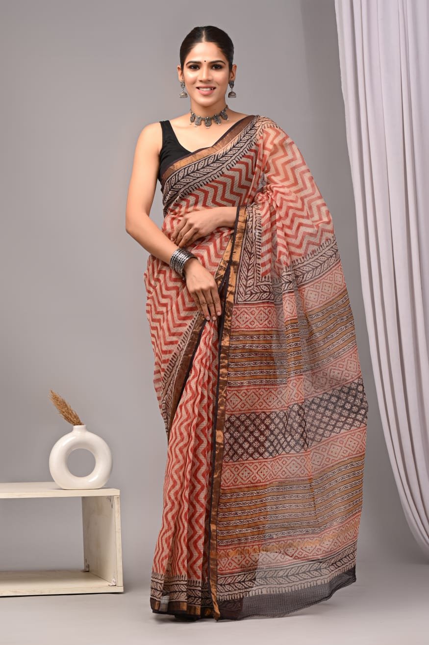 Rust and brown Kota Doriya saree with geometric hand block motifs