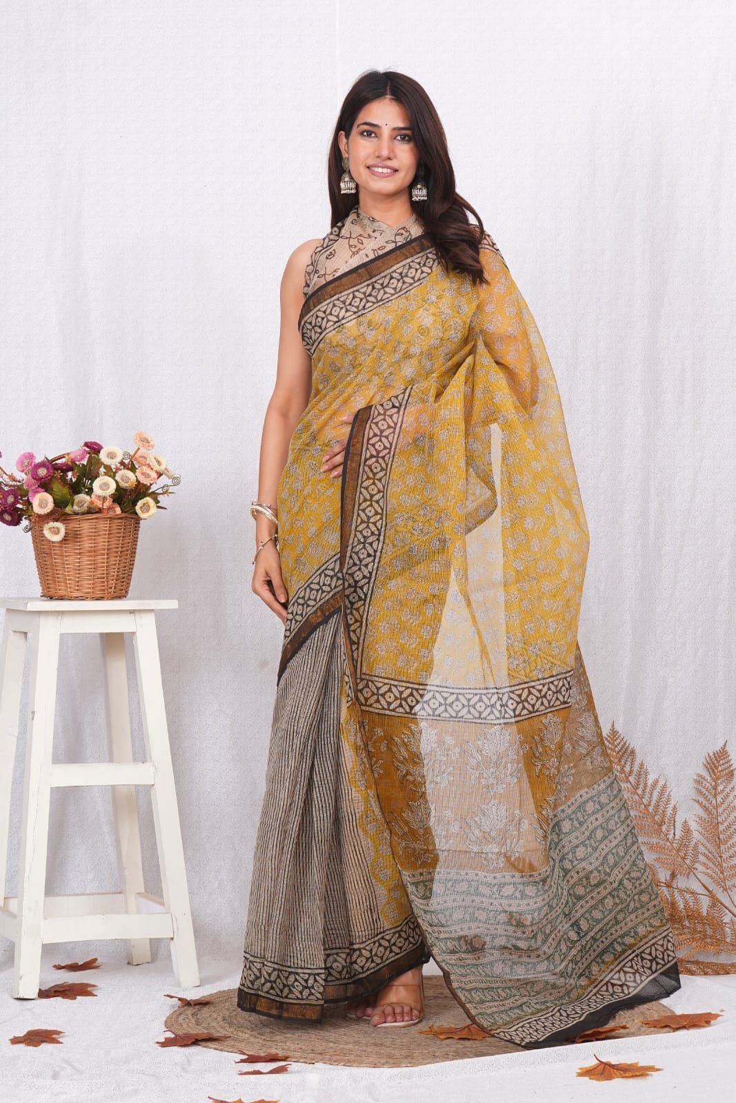 Yellow and black floral Bagru block print Kota Doriya saree with black border