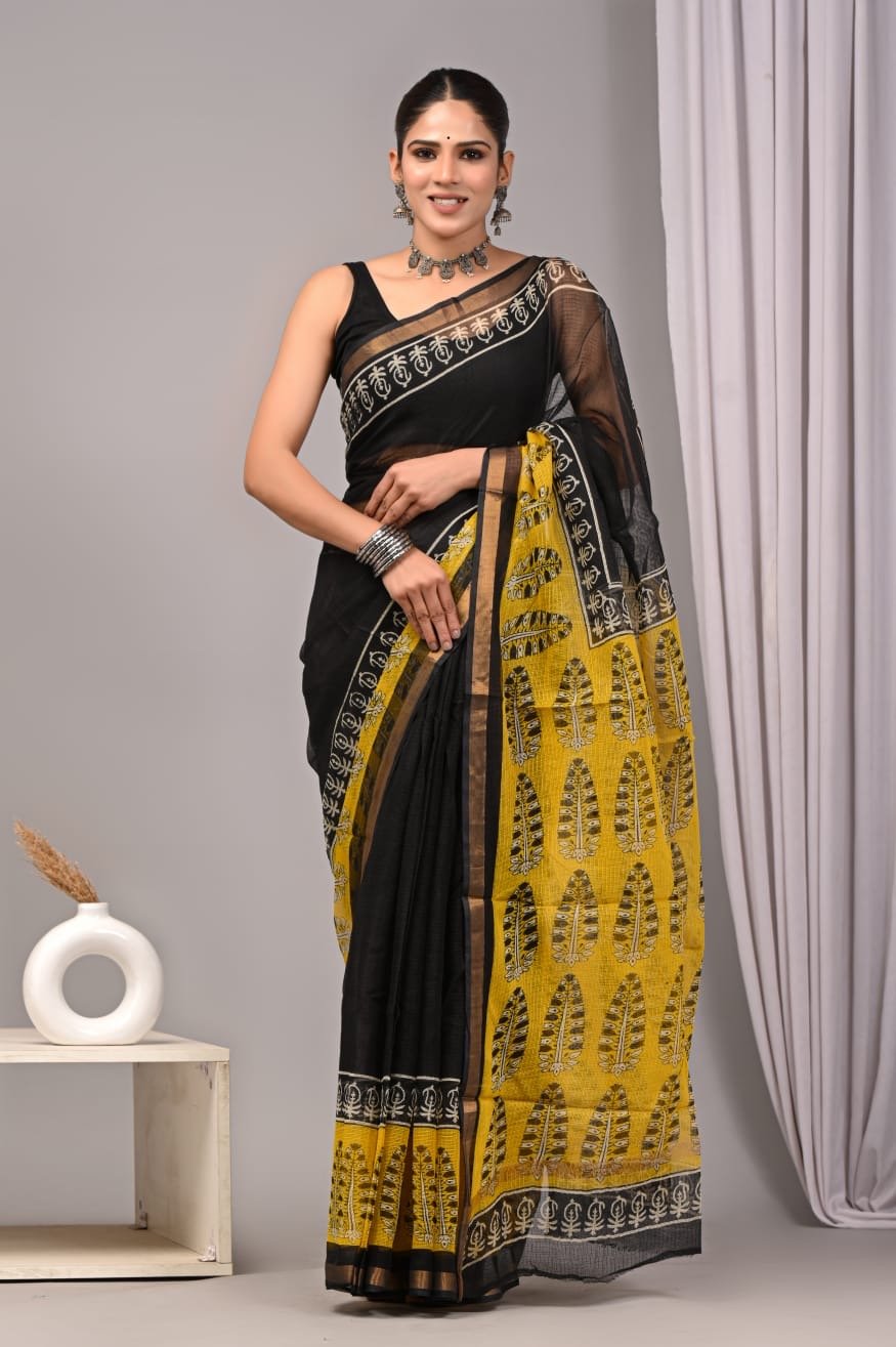 Yellow and black saree with leaf motifs and floral border design