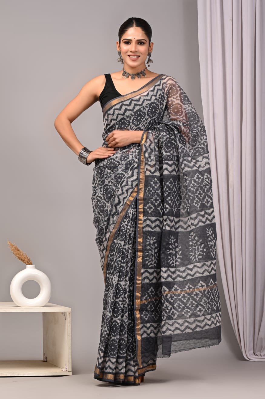 Black and white saree with geometric Bagru hand block prints and gold border