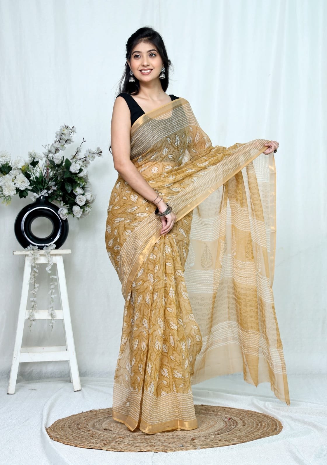Golden saree with floral Bagru hand block print and khat texture