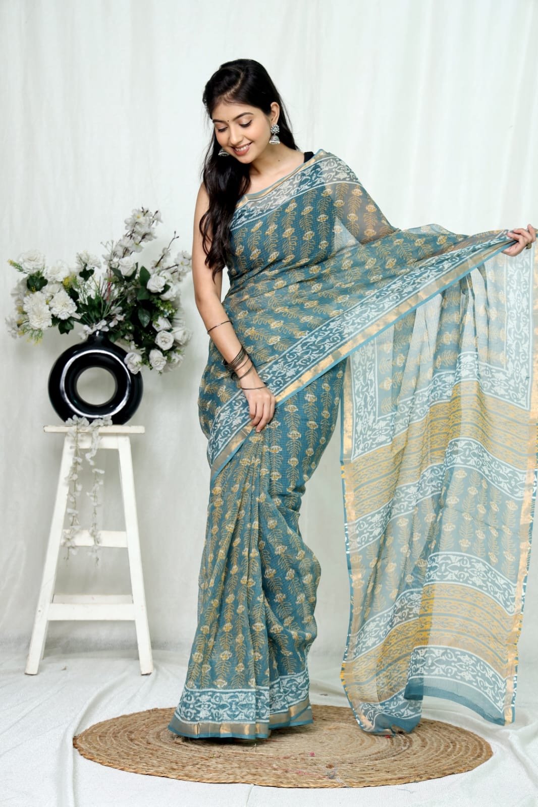 Teal Kota Doriya saree with floral Bagru hand block print motif