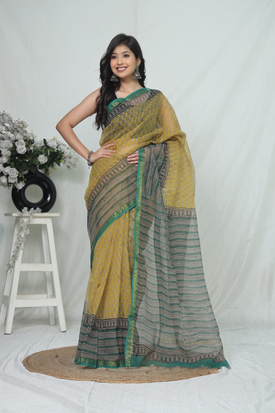 Yellow and green saree with floral motifs and Bagru block print