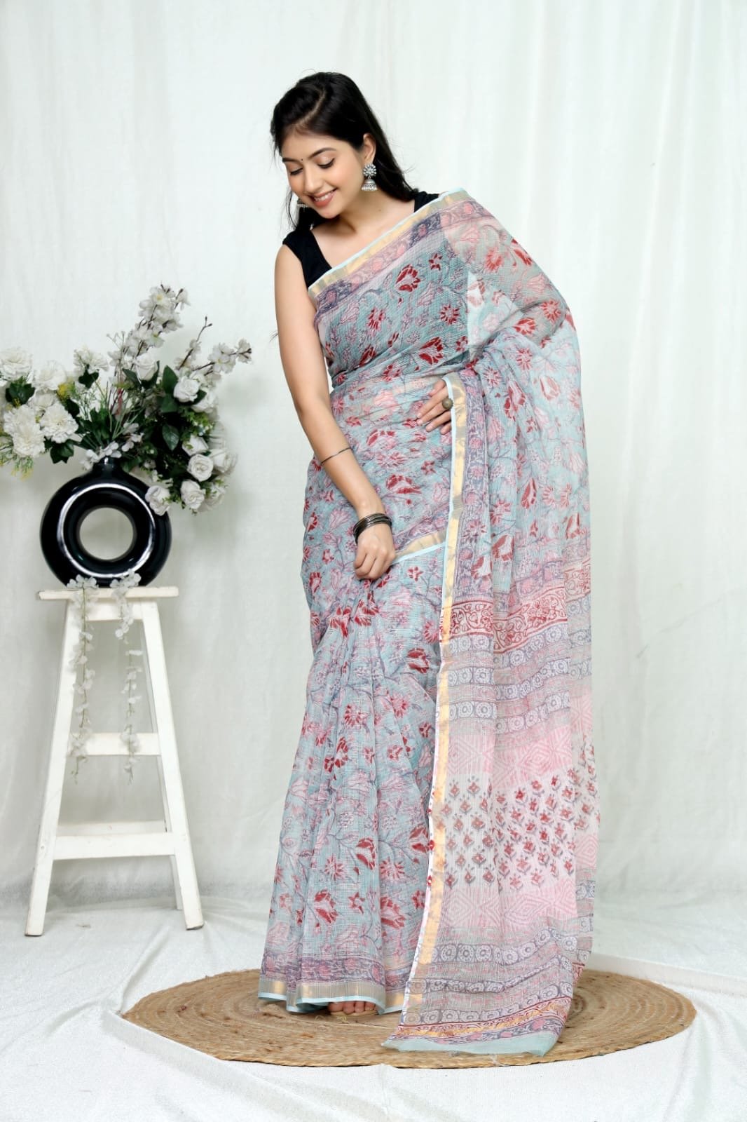Blue Kota Doriya saree with floral Bagru hand block print motifs