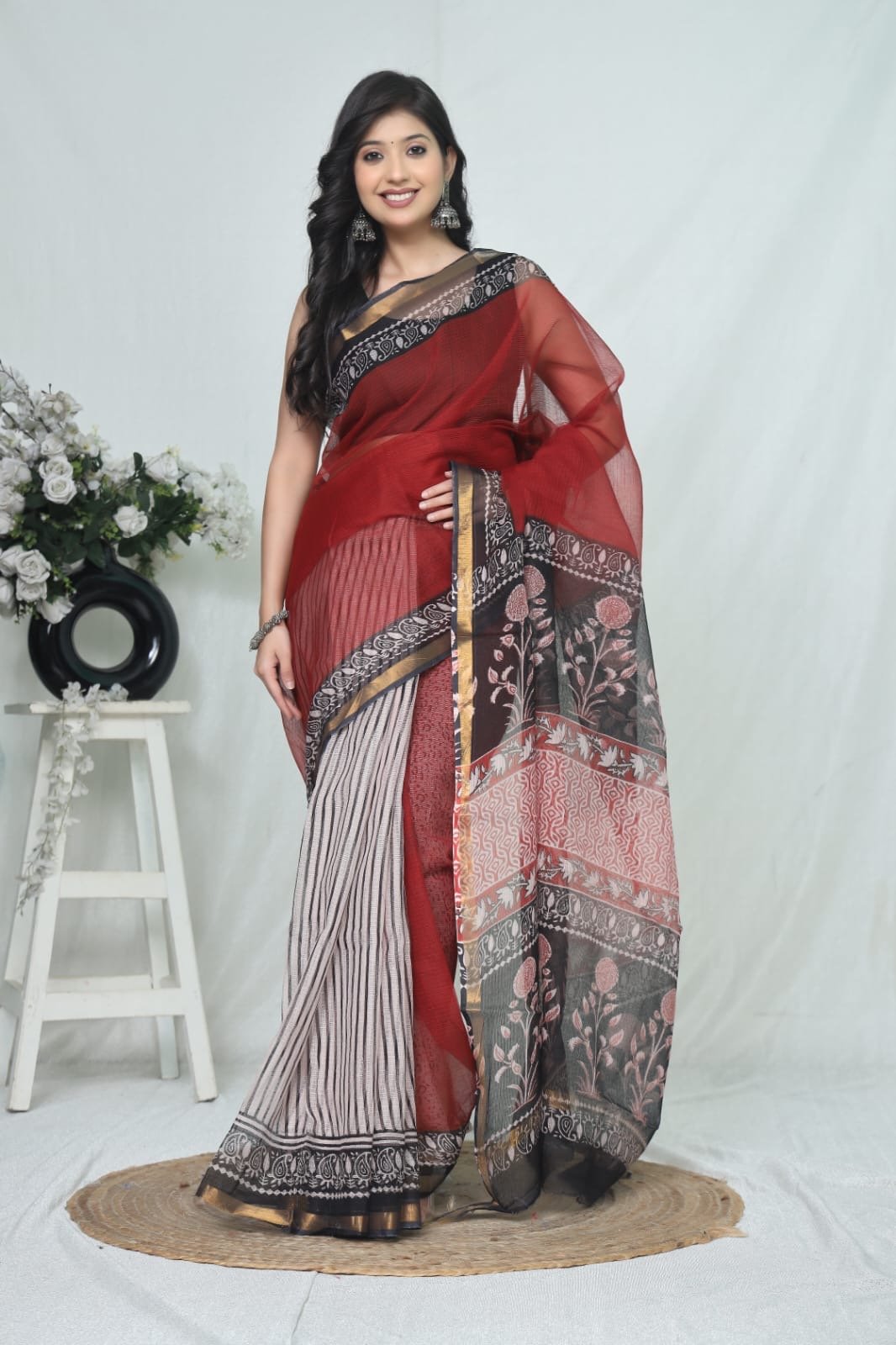 Red floral Kota Doriya silk saree with intricate Bagru block print