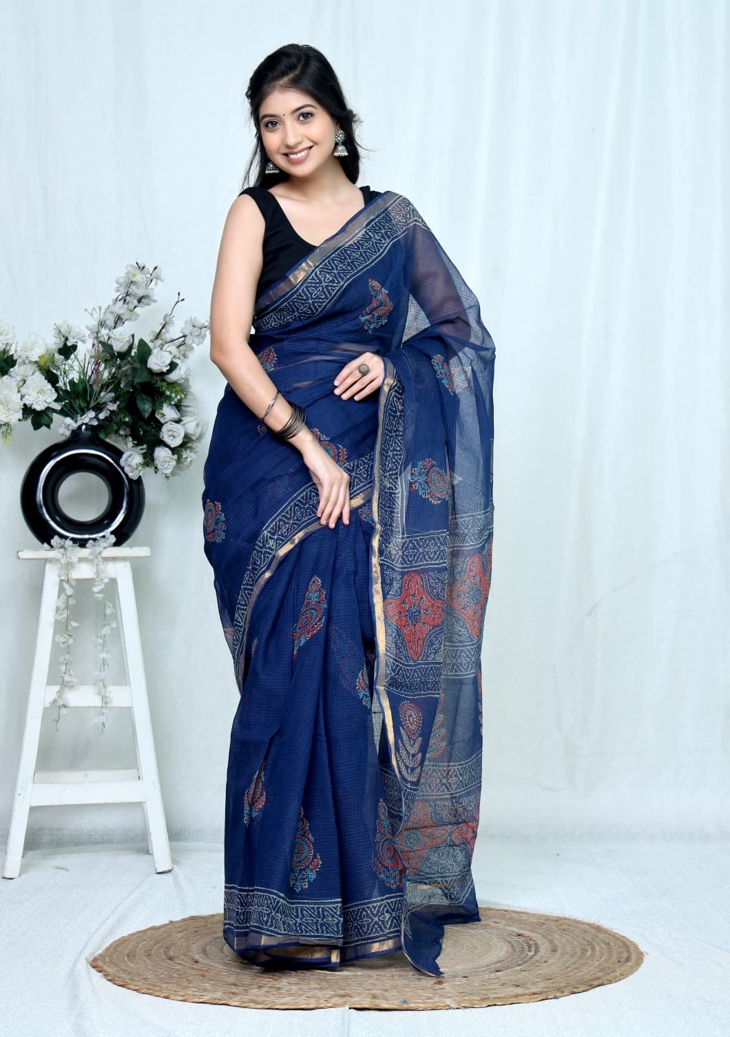 Navy blue saree with floral Bagru hand block prints and khat texture