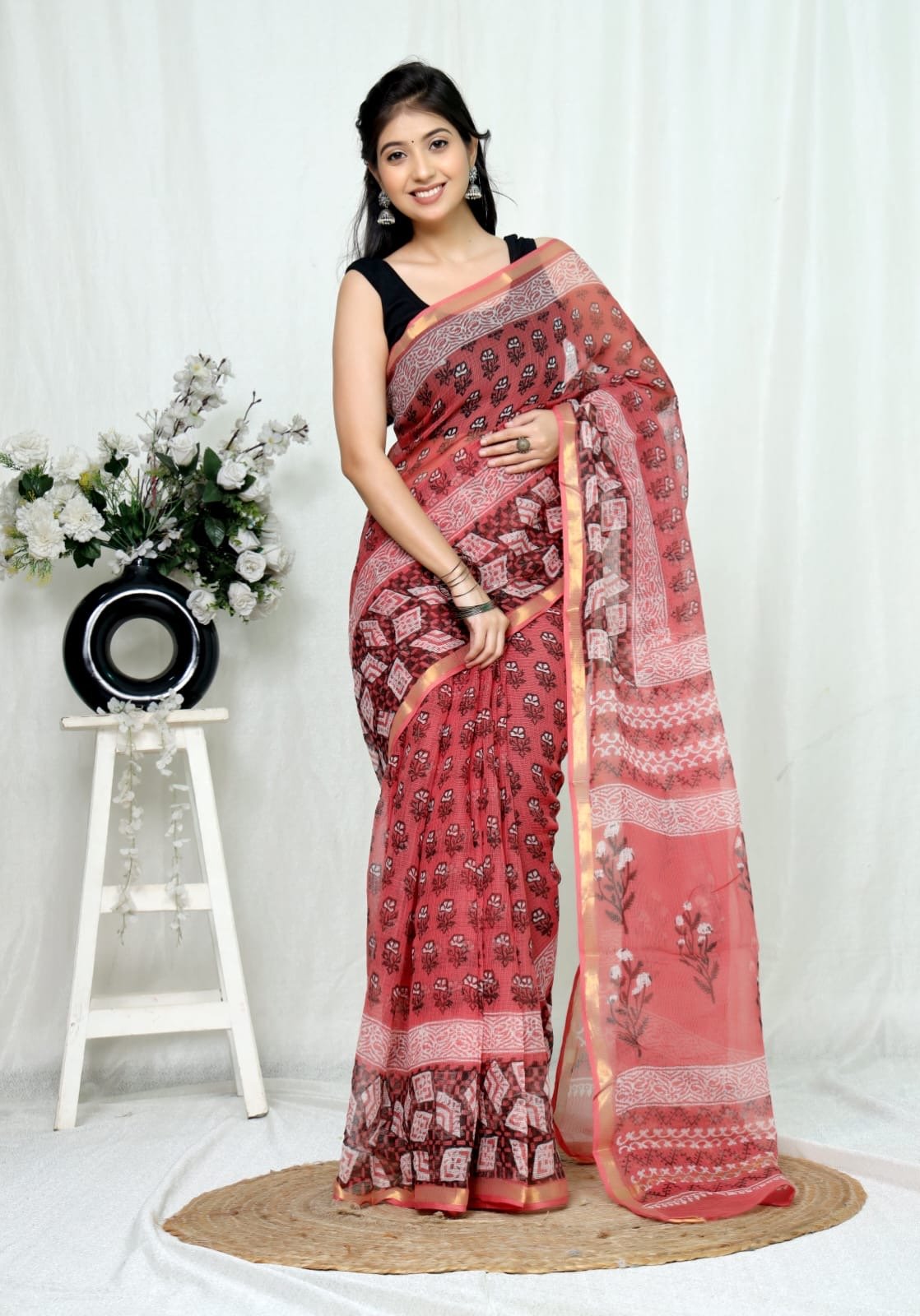 Red saree with floral Bagru hand block print and border design