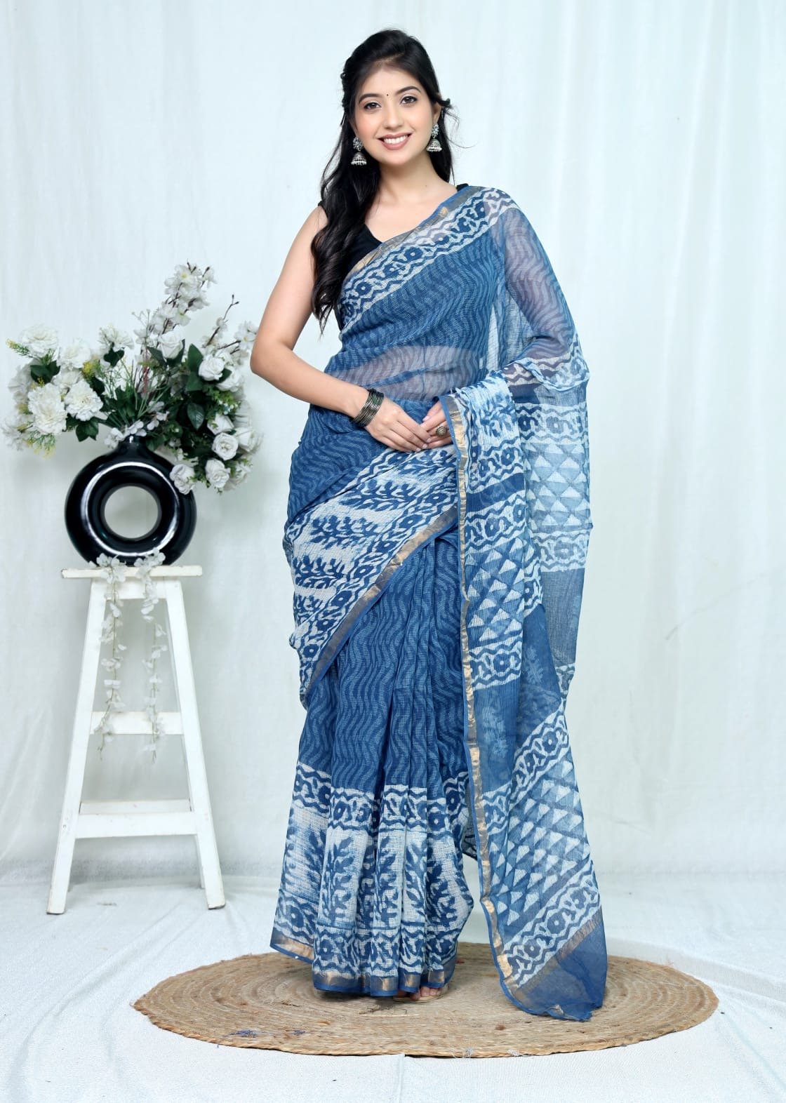 Blue Kota Doriya silk saree with floral and geometric motifs in Bagru hand block print