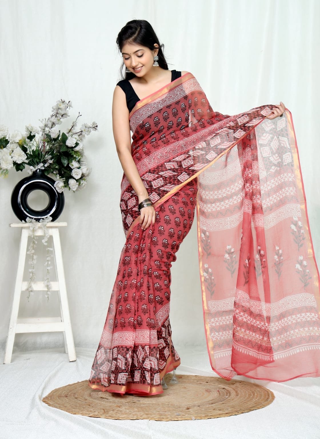 Red saree with floral and geometric Bagru hand block print patterns