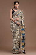 Beige and blue floral hand block print Assam silk saree with bold borders