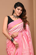 Pink saree with geometric patterns and hand block print detailing