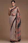 Saree with black and red floral patterns, intricate border design