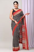 Black and red saree with geometric hand block patterns and intricate border design