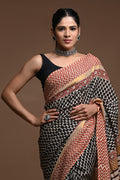 Black and red saree with zigzag and buta motifs in hand block print