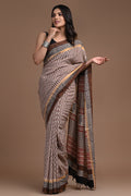 Beige and maroon floral Assam Silk saree with intricate border and pallu
