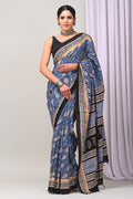 Blue saree with paisley motifs and geometric border in Assam Silk fabric