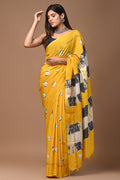 Yellow saree with floral motifs and geometric border design
