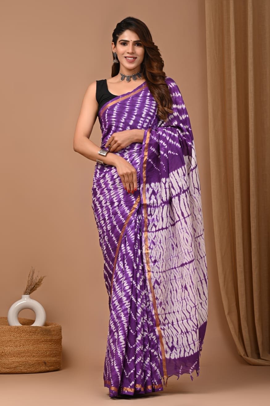 Purple saree with tie-dye pattern and hand block motifs