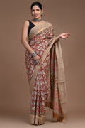Rust red saree with floral motifs and geometric pallu in Assam Silk