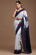 Navy and white tie-dye Assam Silk saree with golden border geometric motifs