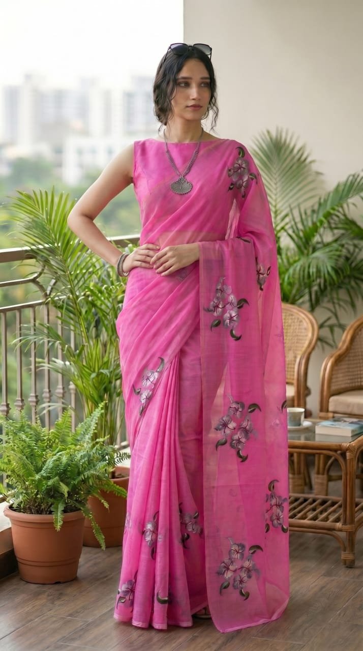 Pink saree with floral motifs and Bagru block print design