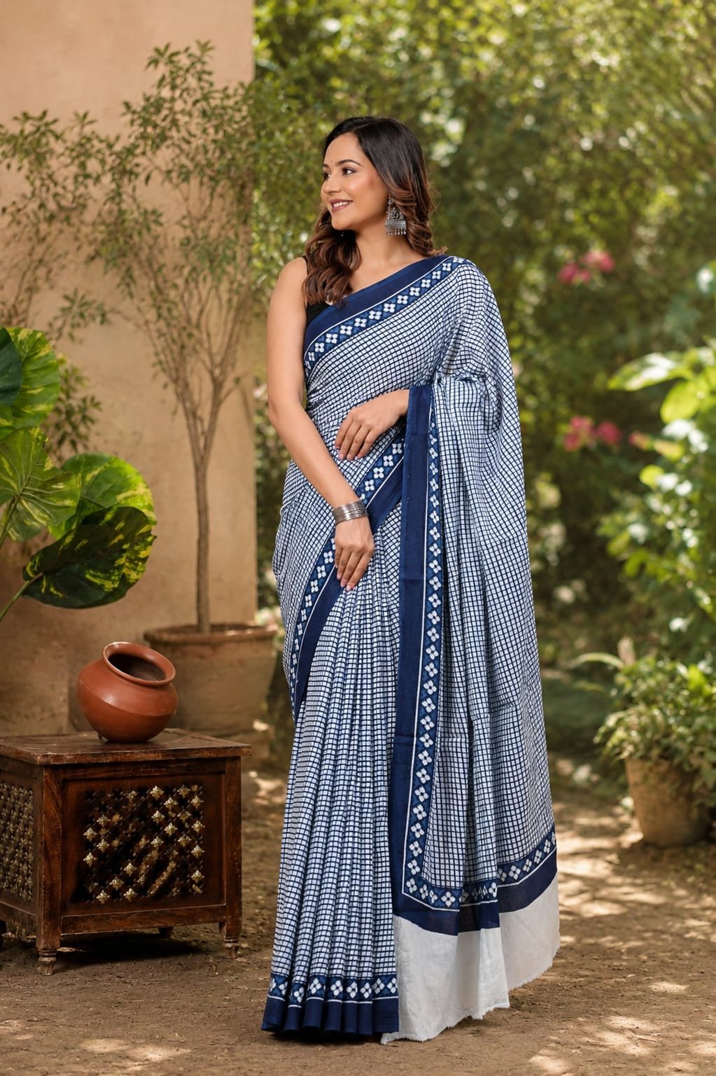 Blue and white geometric patterned Mul Cotton saree with elegant border