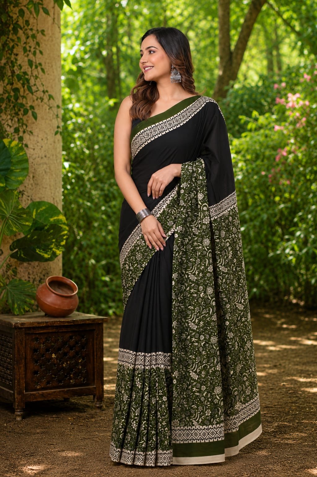 Black and green saree with floral and geometric Bagru motifs