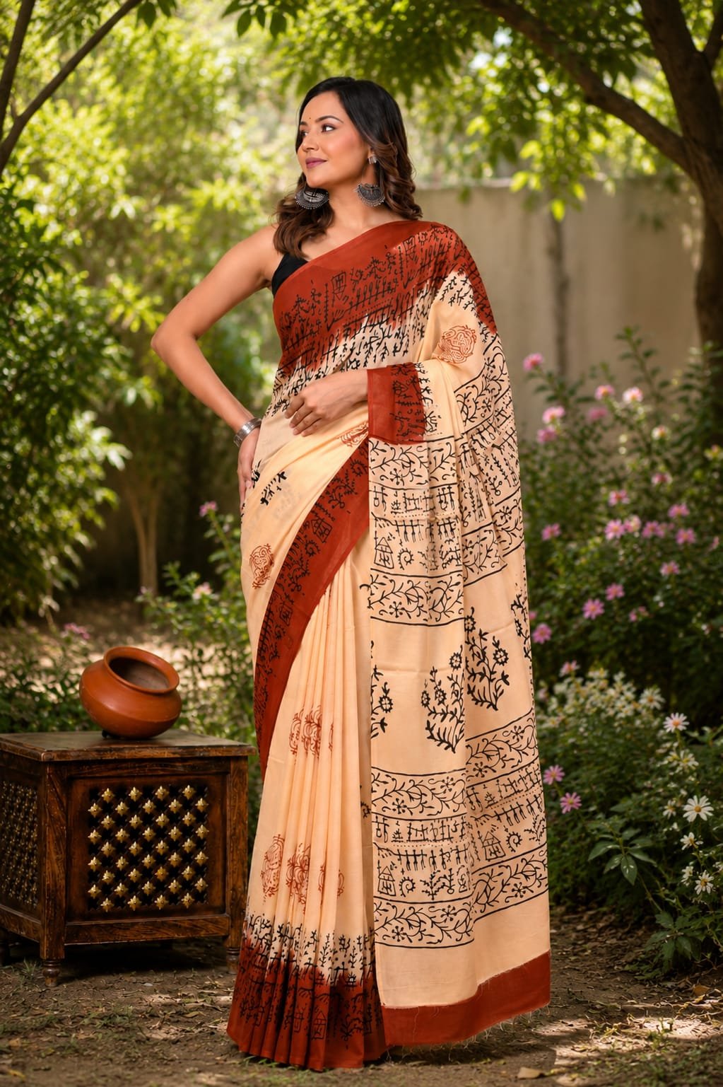 Rust and cream saree with geometric motifs and Bagru hand block print design